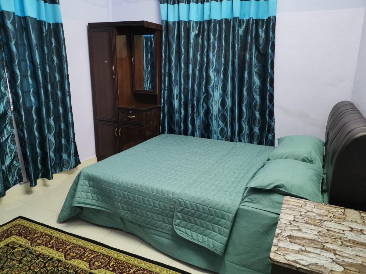 Desa Kemboja Homestay Pantai Cenang  Extérieur photo